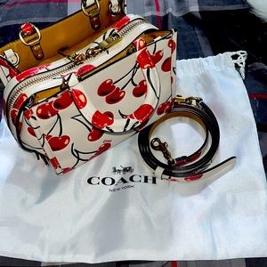 Cherry coach collection rogue small crossbody